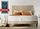 Zinus mattress on a beige upholstered bed with warm neutral pillows, shown beside a Newsweek award badge reading “America’s Best Home & Garden Brands 2023” to highlight comfort, quality, and recognized brand performance in a calm modern bedroom