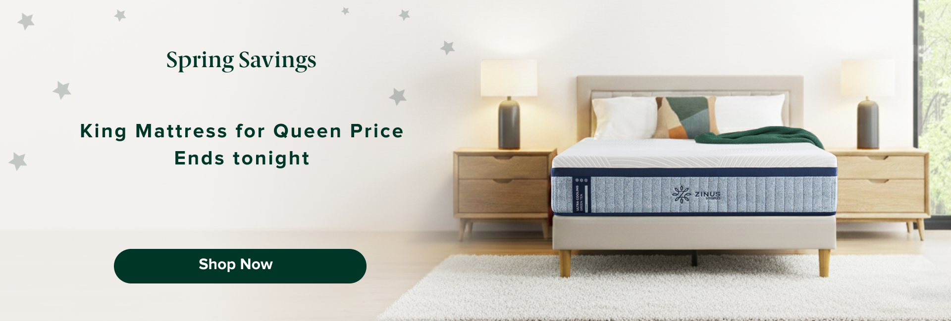 Spring savings sale on king mattress for queen price, ending tonight, with shop now call to action; Zinus hybrid mattress shown on a modern upholstered bed with wood legs, styled bedroom with nightstands, lamps, neutral decor, and soft rug for a clean, contemporary sleep setup.