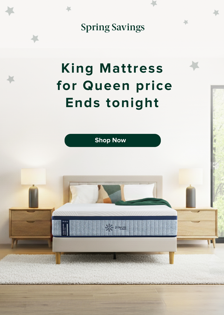 Spring savings sale on king mattress for queen price, ending tonight, with shop now call to action; Zinus hybrid mattress shown on a modern upholstered bed with wood legs, styled bedroom with nightstands, lamps, neutral decor, and soft rug for a clean, contemporary sleep setup.