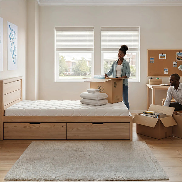 Young woman unpacking the Dorm 101 bundle in a bright dorm room with a man nearby, showing a twin bed and study setup.