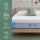 Zinus Cooling Green Tea Hybrid Mattress, Queen, on wood platform bed frame with white pillows and sage cushion, side icons reading cooling comfort, customized support, targeted pressure relief, and all-night freshness.