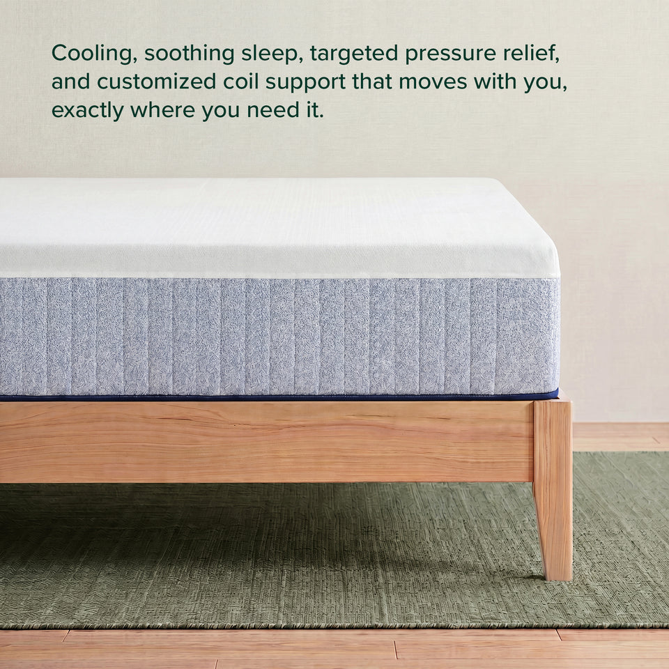 Zinus Cooling Green Tea Hybrid Mattress, Queen, corner view on wood platform bed frame with headline text reading cooling, soothing sleep, targeted pressure relief, and customized coil support that moves with you, exactly where you need it.