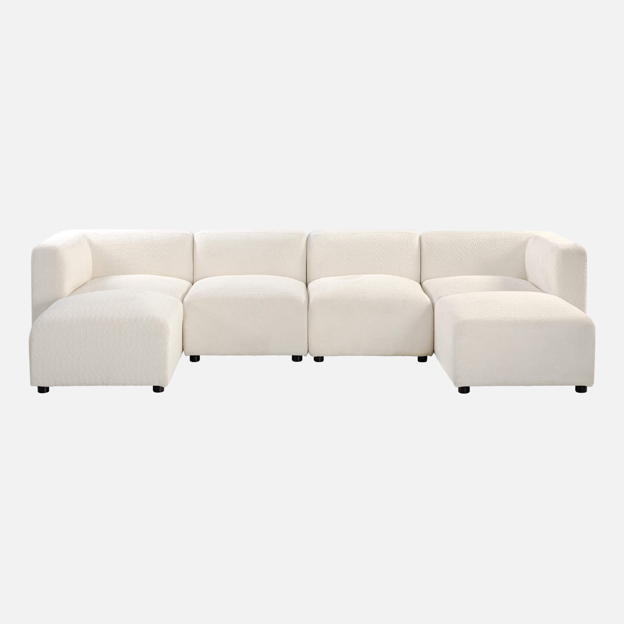 The Luca Double Chaise Sectional Sofa accompanied by four separate ottomans