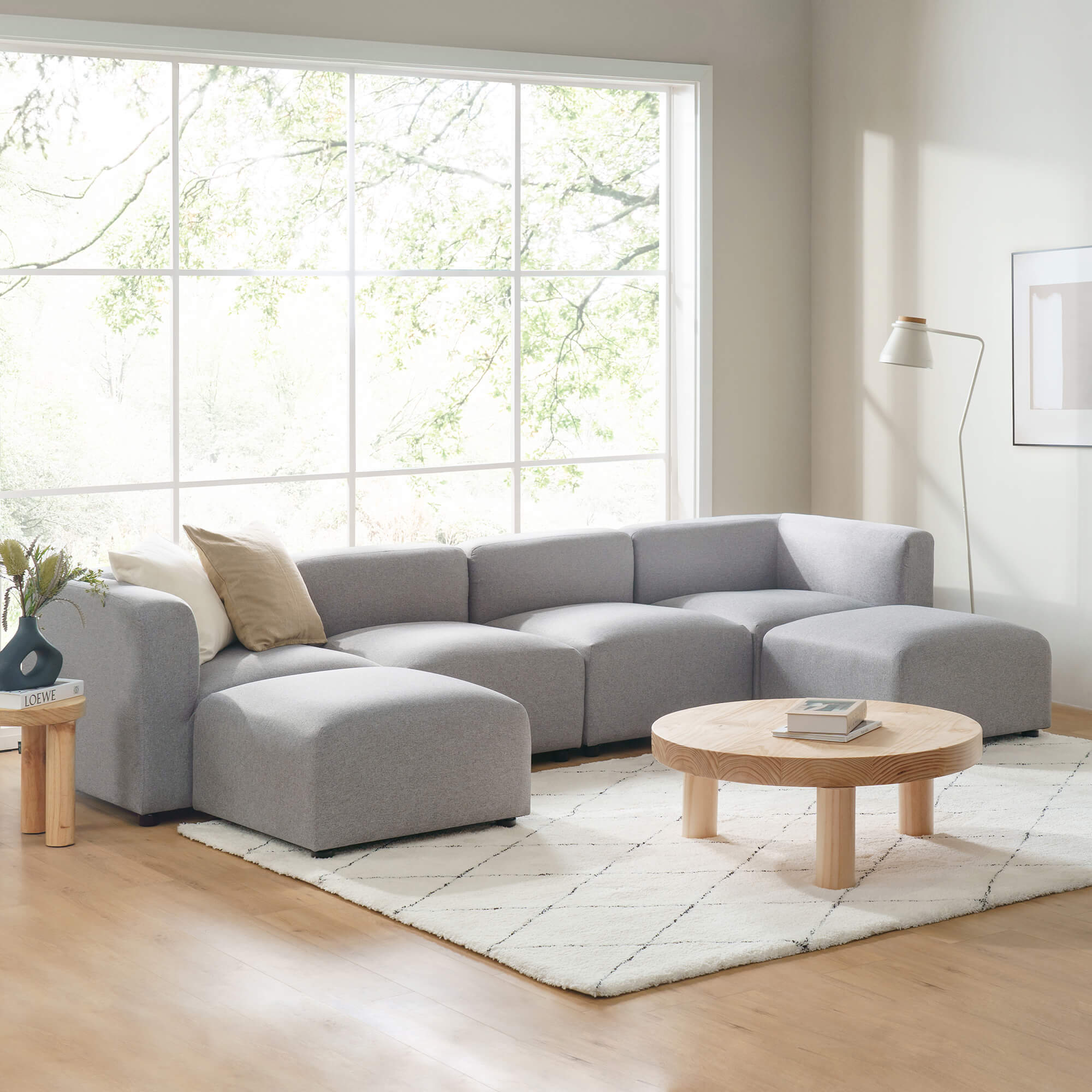 Spacious  grey Luca Double Chaise Sectional Sofa in a modern living room setting 
