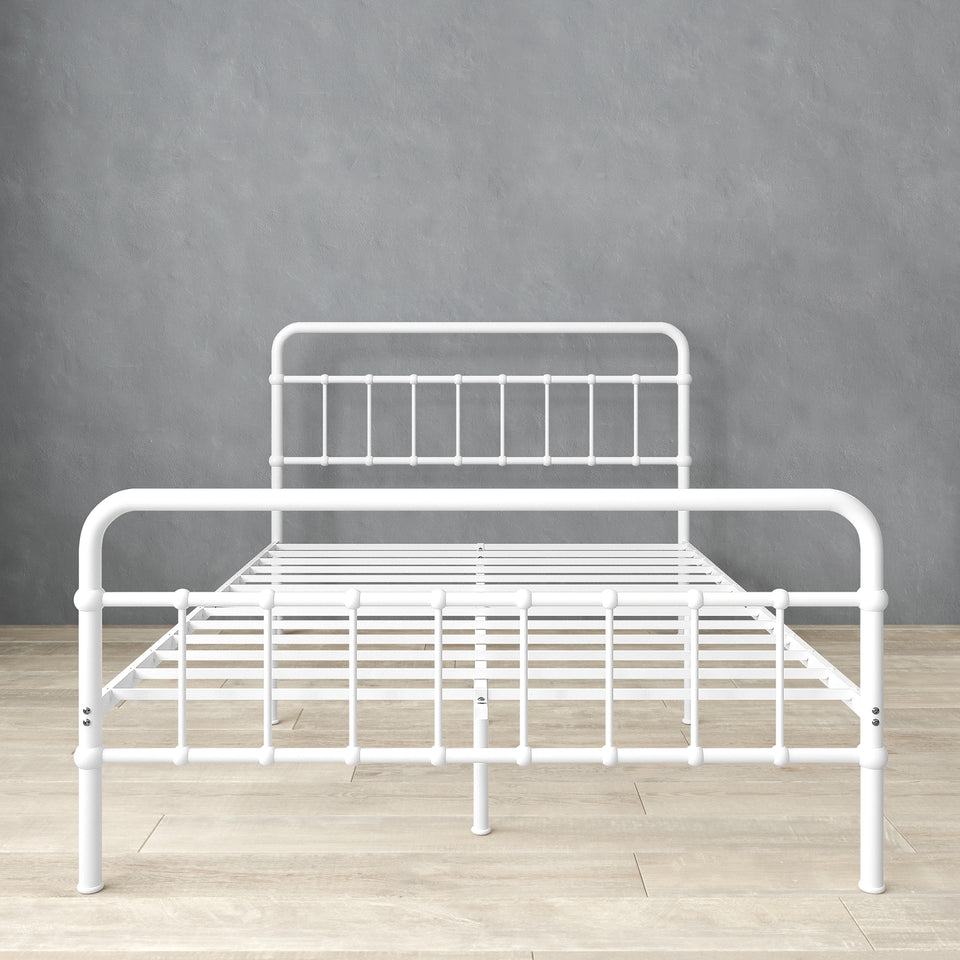 Front view of Zinus metal platform bed frame with headboard and footboard, shown in white steel. Clean lines and durable slats create a supportive base for queen or full mattresses. Functional design eliminates need for box spring while maximizing durability and mattress life.
