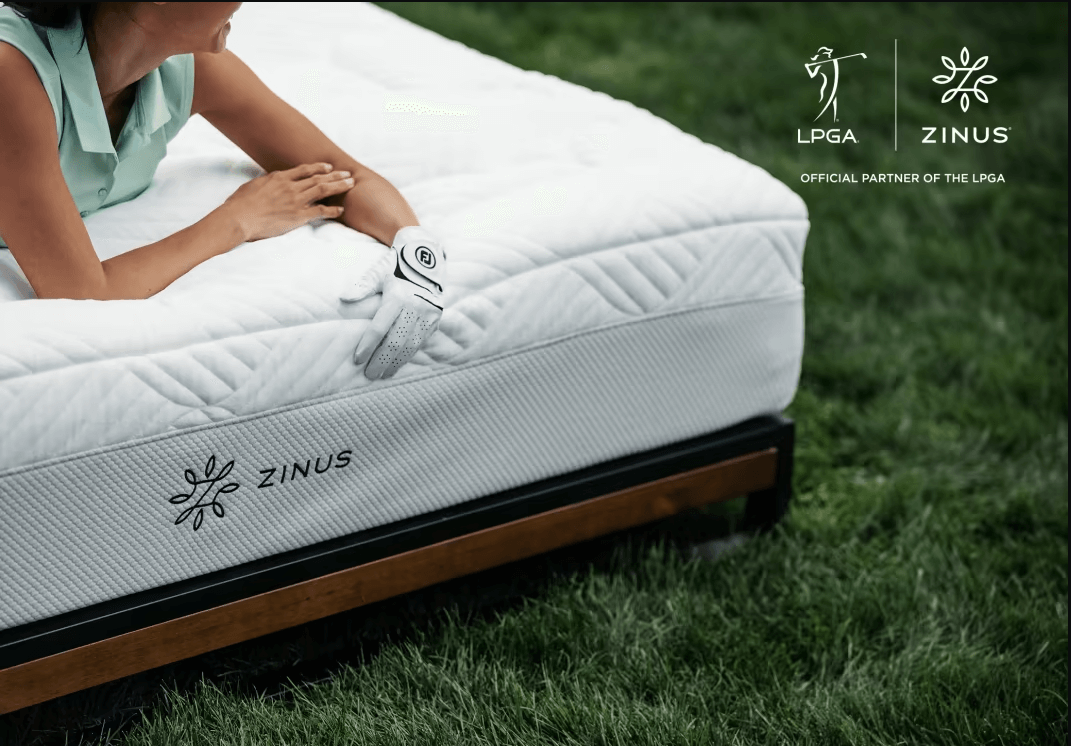 lpga and zinus - girl sitting on bed on putting field
