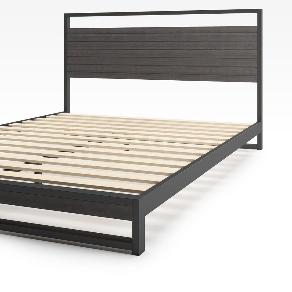 "Zinus Suzanne Platform Bed Frame in bamboo and black steel, angled view showcasing durable slats and clean-lined frame. Combines natural bamboo warmth with sturdy steel structure for modern industrial appeal and reliable mattress support.