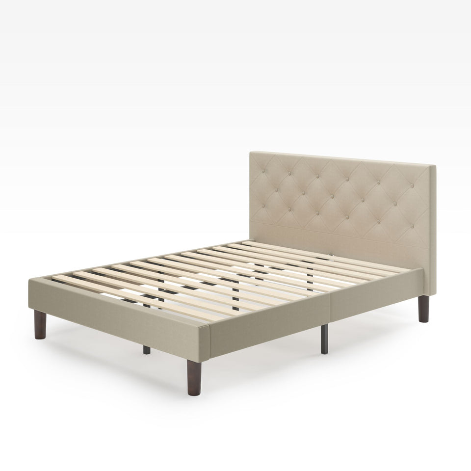Zinus Shalini Upholstered Platform Bed Frame in beige velvet finish with diamond-stitched tufted headboard. Features durable wooden slats for mattress support, sturdy legs, and modern low-profile design that complements contemporary and minimalist bedroom styles.